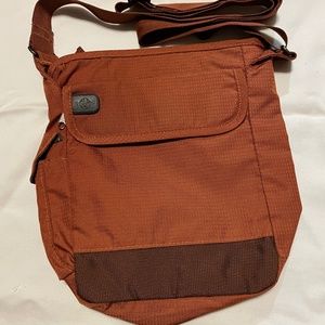 Eagle Creek rust colored Crossbody bag